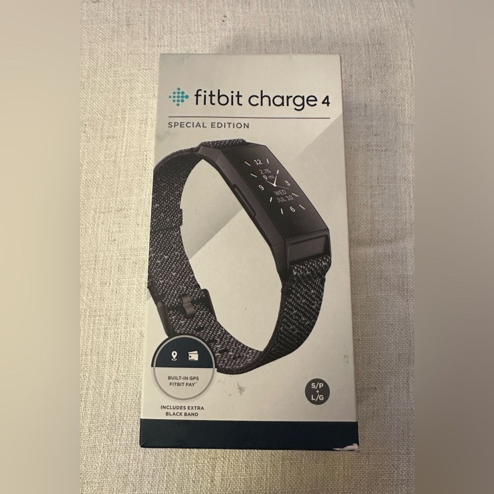 Fitbit Charge 4 Special Edition Granite Woven Band & Extra Black Band. ($250)